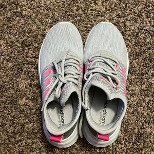 I am selling Gray Adidas with pink and teal stripes, they are size 7.5.